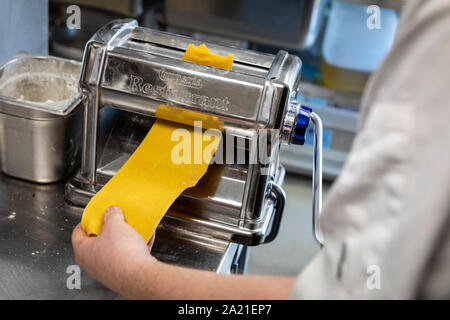 Rolling out handmade pasta Stock Photo