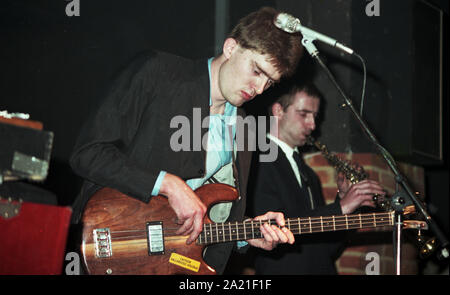 Sore Throat New Wave Band performing 'live' c1980  Vocals: Justin Ward  Bass: Dan Flowers  Keyboards: Matthew Flowers  Guitar: Reid Savage  Drums: Clive Kirby  Sore Throat was a British new wave / punk band from Highgate, London, England, formed in 1975, producing 1 album in 1980, Sooner Than You Think, on the Dureco label and six singles.  Photo by Tony Henshaw Archive Stock Photo