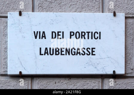 Street sign of the Arcade Via del Portici Laubengasse in the old town of Bolzano - Italy. Stock Photo