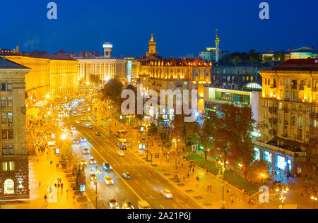 Twilight view of Kiev cityscape with illuminated Khreshatyk street in downtown aerial view, Ukraine Stock Photo