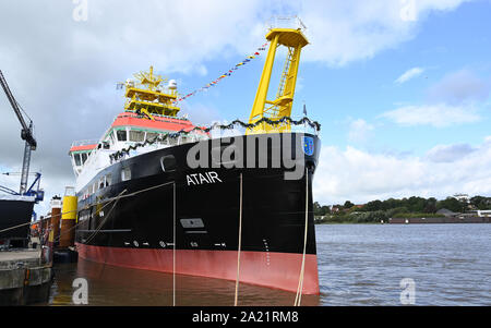 30 September 2019, Lower Saxony, Bern: The surveying, wreck search and research vessel 'Atair' for the Federal Maritime and Hydrographic Agency (BSH) is moored on the quay of the Fassmer shipyard after its christening. With a length of 75 metres, the 114 million euro newbuilding is the largest BSH ship to date. Photo: Carmen Jaspersen/dpa Stock Photo