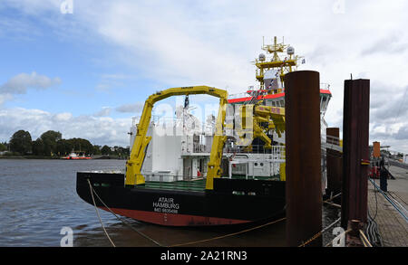 30 September 2019, Lower Saxony, Bern: The surveying, wreck search and research vessel 'Atair' for the Federal Maritime and Hydrographic Agency (BSH) will be moored on the quay of the Fassmer shipyard after its christening. With a length of 75 metres, the 114 million euro newbuilding is the largest BSH ship to date. Photo: Carmen Jaspersen/dpa Stock Photo