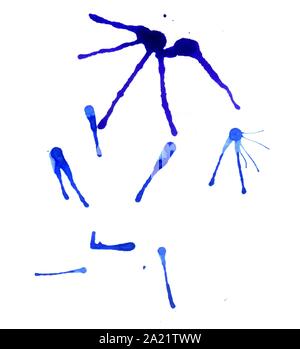 Abstract blue dried ink splashes or inkblots on white paper Stock Photo ...