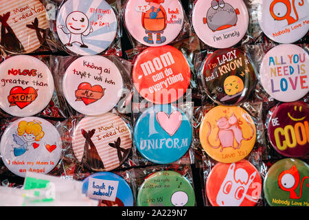 Colorful sticker at a small shop on street in Saigon Vietnam. Royalty high quality stock image of color, sticker. Stock Photo