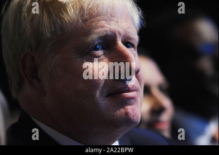 Manchester, UK. 30th Sep, 2019. (centre) Boris Johnson, Prime Minister, listening to the keynote speech to conference of Sajid Javid, Chancellor of the Exchequer, on the second day of the Conservative Party Conference at the Manchester Central Convention Complex. Credit: Kevin Hayes/Alamy Live News Stock Photo