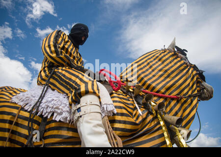 Black man in costume for brazil carnival isolated on orange background  Stock Photo - Alamy