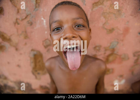 Afro-Brazilian boy stick tongue out in joyful moment Stock Photo