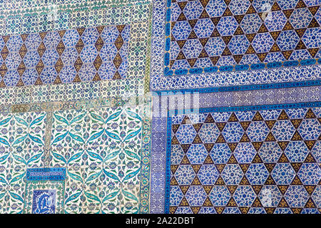 Ancient Ottoman handmade turkish tiles with floral patterns from Topkapi Palace in Istanbul, Turkey Stock Photo
