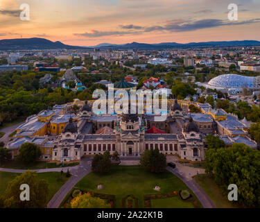 Szechenyi thermal bath in the city park, Budapest, Hungary with Castle of Vajdahunyad and forest Stock Photo