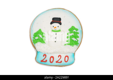 gingerbread cookie snow globe with a snowman inside isolated on a white background Stock Photo