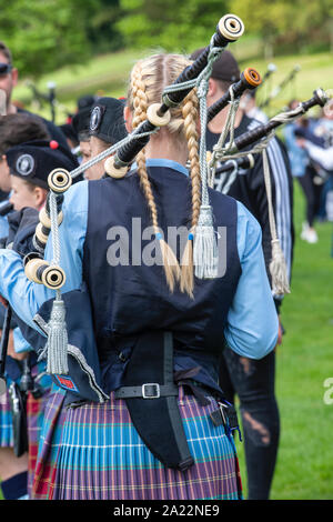 Burntisland and District Pipe Band playing bagpipes at Peebles highland games. Peebles, Scottish borders, Scotland Stock Photo