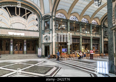 The art deco Lux cinema  inside the beautiful glass ceilinged arcade Galleria San Federico in Turin ,Italy