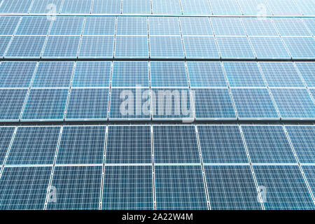 Aerial top view of a solar panels power plant. Renewable energy concept . Detailed close-up of modern large photovoltaic solar panels Stock Photo