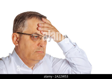 A man of age holds his hand on his forehead. On a white background. Stock Photo