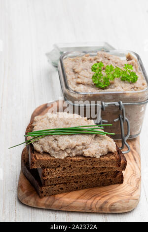 Forshmak  paste from herring with herbs on white wooden table Stock Photo