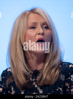 Manchester, UK. 30th Sep, 2019. Esther McVey, Minister of State for Housing and MP for Tatton speaks at day two of the Conservative Party Conference in Manchester. Credit: Russell Hart/Alamy Live News Stock Photo