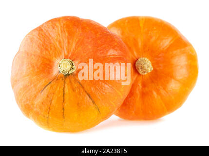 Hokkaido pumpkin. Two whole orange pumpkins on white background Stock Photo