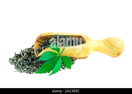 Jiaogulan Miracle Grass Leaf Chinese Herb Tea in Wooden Spoon On White Stock Photo