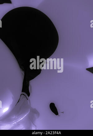 A magical silhouette in purple dark background Stock Photo