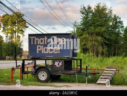 That One Place sign on the roadside in Humble, TX. This cajun seafood restaurant was founded in 2012 is family-owned and operated. Stock Photo