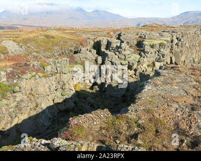 The craggy volcanic landscape at Almannagja Gorge where the North American tectonic plate separates from the Eurasian. Stock Photo