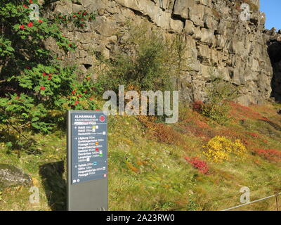 The information board with directions for tourists on the trail at Almannagja Gorge, Thingvellir National Park, West Iceland. Stock Photo