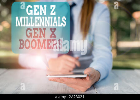 Writing note showing Gen Z Millennials Gen X Boomers. Business concept for Generational differences Old Young showing Female business person sitting b Stock Photo