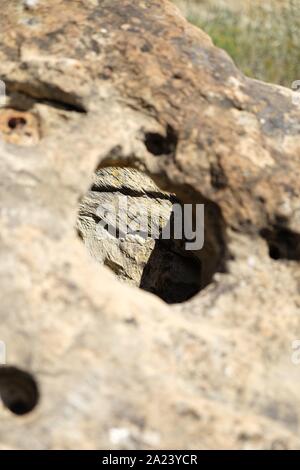 Weather eroded rocky formation Stock Photo