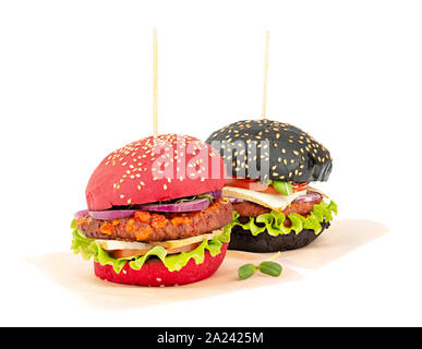Two healthy vegan burgers on a paper isolated on white background Stock Photo