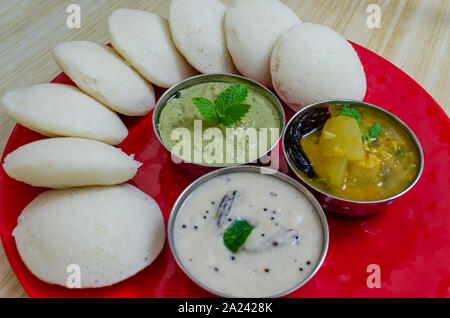 Beautifully arranged Idli, Sambar and chutneys. Macro Shot. Stock Photo