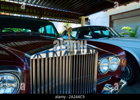 Two vintage Rolls Royce automobiles, once driven by the owners of the House of Sampoerna, a clove and tobacco cigarette factory in Surabaya, Indonesia Stock Photo