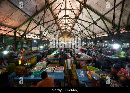 Overview look at the seafood selling area of the old, local, traditional market, Pasar Pabean. In the Arab Quarter section of Surabaya, Indonesia. Stock Photo