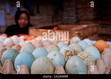 Blue eggs for sale at the old, local, traditional market, Pasar Pabean. In the Arab Quarter section of Surabaya, Indonesia. Stock Photo