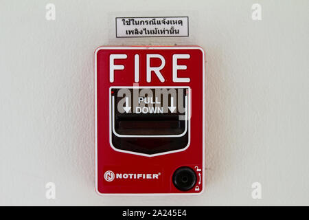 fire extinguisher hose reel signage on the wall Stock Photo
