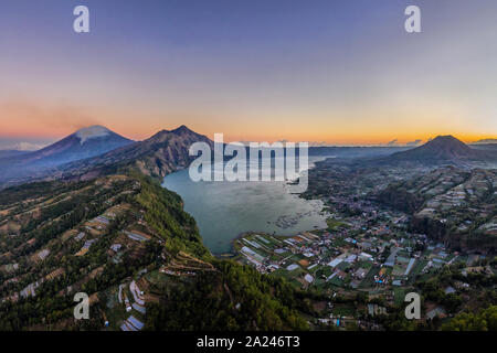 Aerial view of Indonesian volcano Batur in the tropical island Bali. Royalty high quality free stock panorama image of Danau Batur, Indonesia. Stock Photo