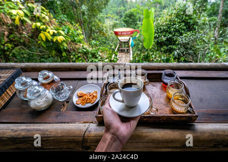 Luwak coffee, Kopi luwak is coffee that includes part-digested coffee cherries eaten and defecated by the Asian palm civet in Bali, Indonesia Stock Photo