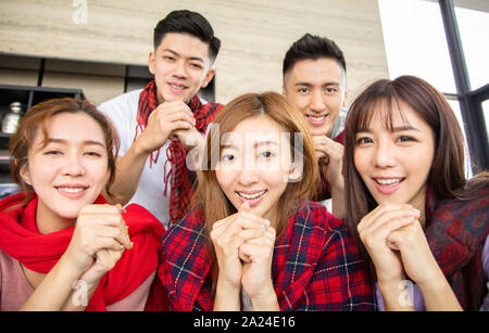 Young people having fun and celebrating chinese new year Stock Photo
