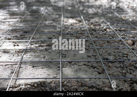 Picture of pouring concrete on a formwork floor at a building site Stock Photo