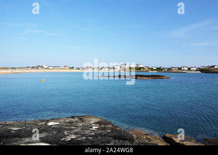 Looking across to the beach at Trearddur Bay on Anglesey in North Wales Stock Photo