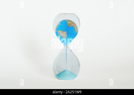 Earth planet in hourglass  - Ecology, global warming, climate change concept Stock Photo