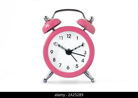 Pink alarm clock on white background - Concept of women and time Stock Photo