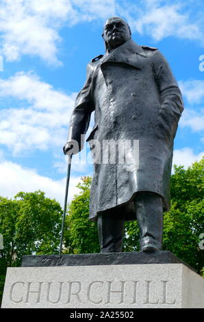 The statue of Winston Churchill in Parliament Square, London. Erected in 1973 the bronze sculpture of the former British Prime Minister is by Ivor Roberts-Jones. Stock Photo