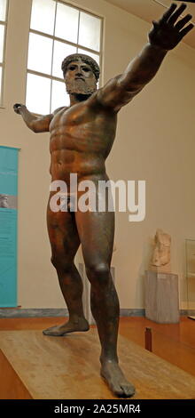 The Artemision Bronze (often called the God from the Sea) is an ancient Greek sculpture that was recovered from the sea off Cape Artemision, in northern Euboea. It represents either Zeus or Poseidon Stock Photo