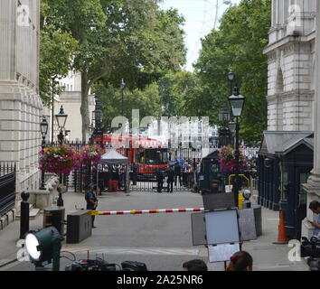 Garbage (refuse) truck arrives in downing street on the morning of the resignation of theresa may as british prime minister. 24th july 2019 Stock Photo