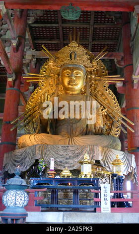 Todai-ji (Eastern Great Temple), is a Buddhist temple complex in the city of Nara, Japan. Though it was originally founded in the year 738 CE, Todai-ji was not opened until the year 752. Its Great Buddha Hall houses the world's largest bronze statue of the Buddha Vairocana, known in Japanese as Daibutsu. The temple also serves as the Japanese headquarters of the Kegon school of Buddhism. The temple is a listed UNESCO World Heritage Site as one of the 'Historic Monuments of Ancient Nara Stock Photo