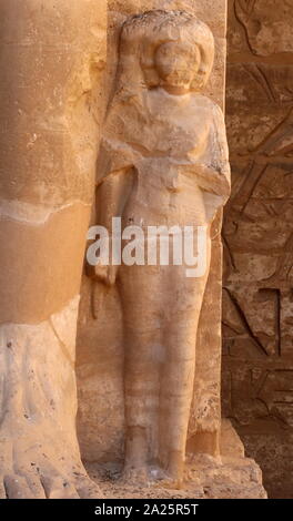 Second Courtyard of the Feasts, Medinet Habu, Thebes, Egypt. Temple of Rameses II at Medinet Habu, Egypt. The Mortuary Temple of Ramesses III at Medinet Habu was an important New Kingdom period temple structure in the West Bank of Luxor in Egypt. The temple has inscribed reliefs depicting the advent and defeat of the Sea Peoples during the reign of Ramesses III. Initial excavation of the temple took place sporadically between 1859 and 1899 Stock Photo