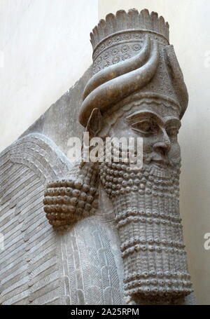 Human-headed winged bull from Sargon II's palace in Dur-Sharrukin, modern Khorsabad. In art, Lamassu were depicted with bodies of either winged bulls or lions and heads of human males. Dur-Sharrukin (Fortress of Sargon?), present day Khorsabad, was the Assyrian capital in the time of Sargon II of Assyria. Khorsabad is a village in northern Iraq, northeast of Mosul. The great city was entirely built in the decade preceding 706 BC Stock Photo