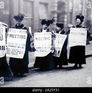 Photograph of suffragettes protesting in Britain. A suffragette was a member of militant women's organisations in the early 20th century who, under the banner 'Votes for Women', fought for the right to vote in public elections, known as women's suffrage. Stock Photo