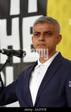 Sadiq Aman Khan, Mayor of London, addresses the 'People's Vote' march in Parliament Square, London. The People's Vote march took place in London on 23 March 2019 as part of a series of demonstrations to protest against Brexit, call for a new referendum, and ask the British Government to revoke Article 50. It brought to the capital hundreds of thousands of protestors, or over a million people according to the organizers. Stock Photo
