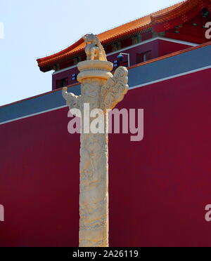 Huabiao (Dragon Pillar), Beijing, China. Ceremonial column used in traditional Chinese architecture. Huabiao are traditionally erected in front of palaces and tombs. The prominence of their placement have made them one of the emblems of traditional Chinese culture. Stock Photo